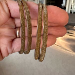 Gold tone bracelets (1 of 5 listings)